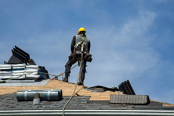 Professional Roofing technician working in Redding, IA